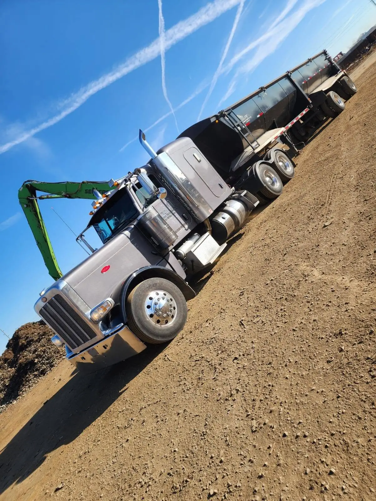 Peterbilt with belly dump trailer