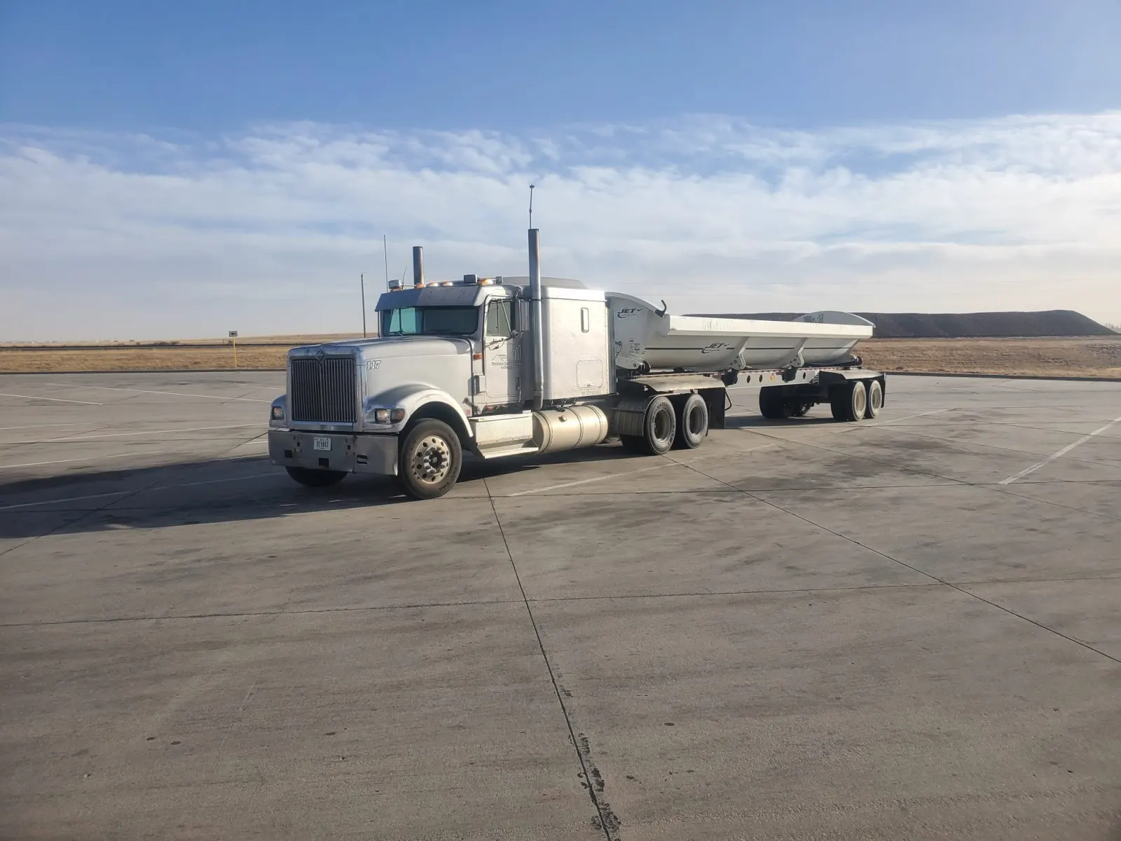 International with belly dump trailers